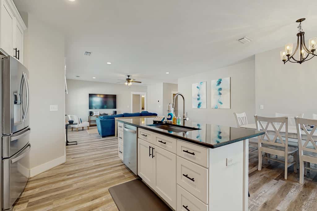 Dog friendly, coastal retreat with fenced yard, private pool, golf cart and cove