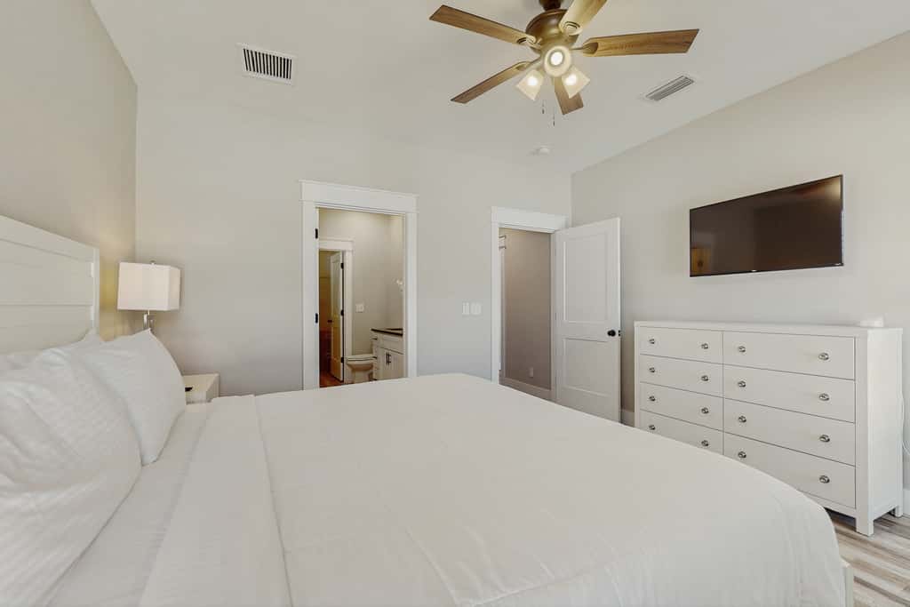 Dog friendly, coastal retreat with fenced yard, private pool, golf cart and cove