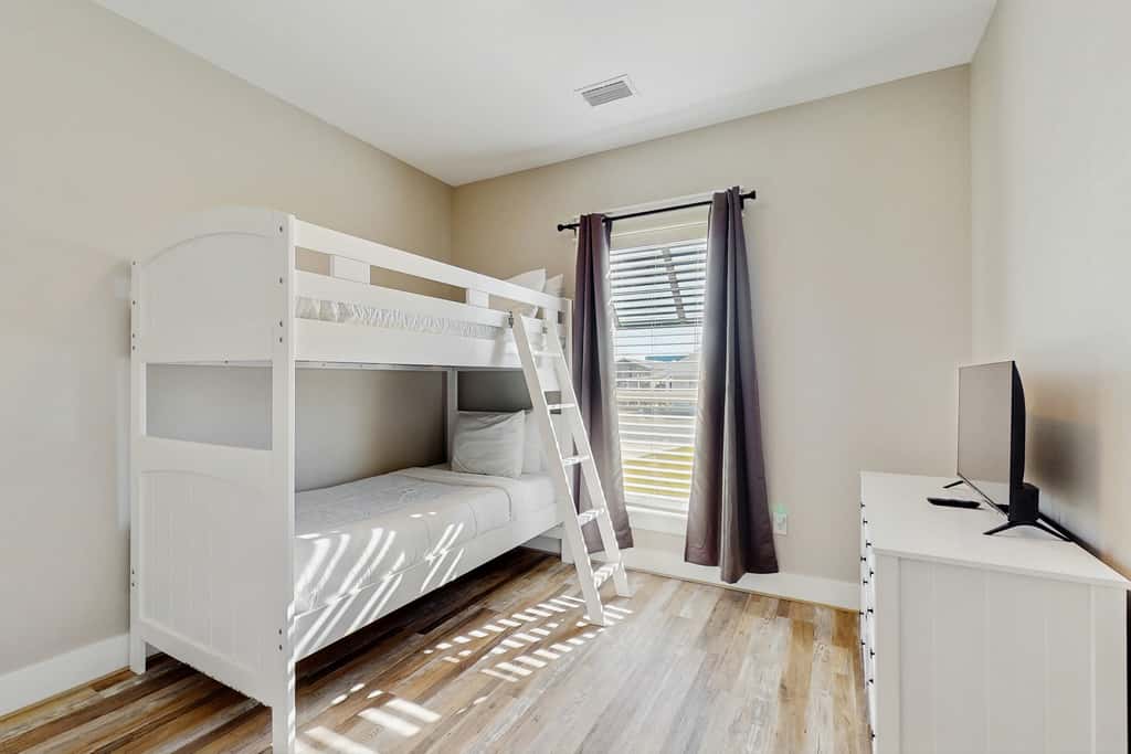 Dog friendly, coastal retreat with fenced yard, private pool, golf cart and cove