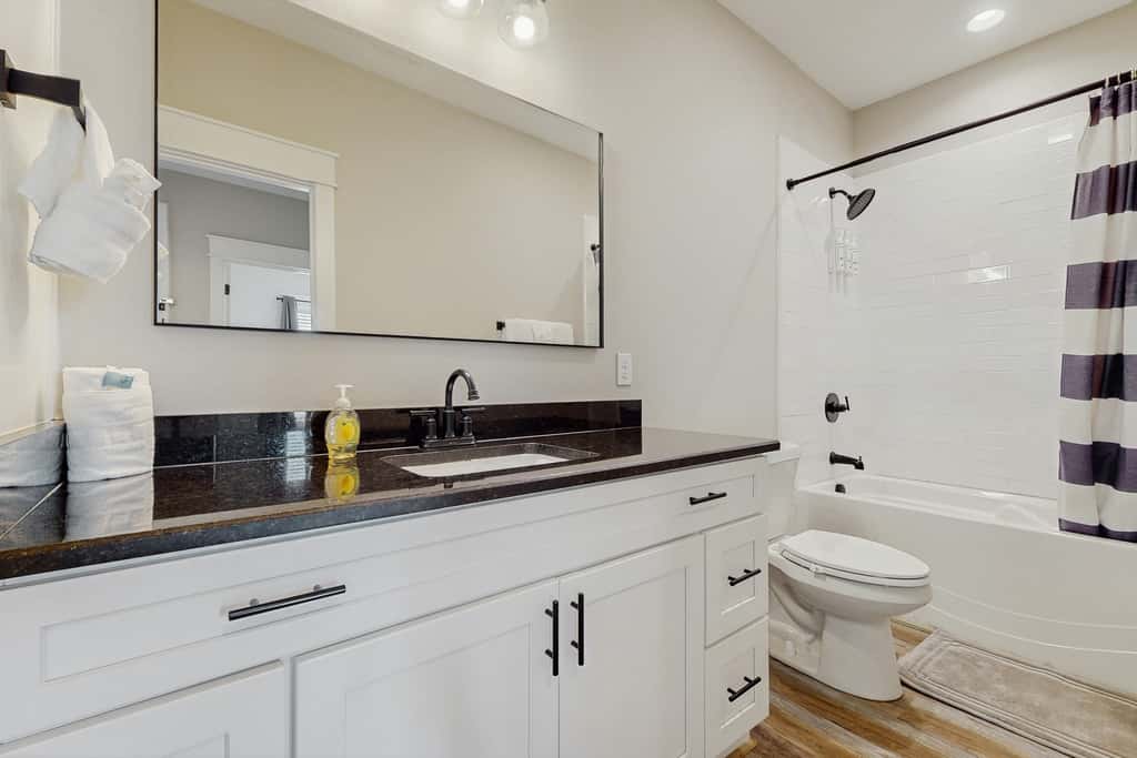 Dog friendly, coastal retreat with fenced yard, private pool, golf cart and cove