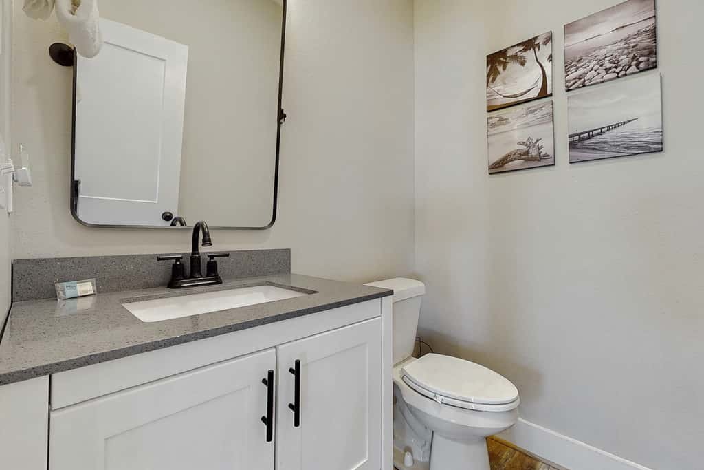Dog friendly, coastal retreat with fenced yard, private pool, golf cart and cove