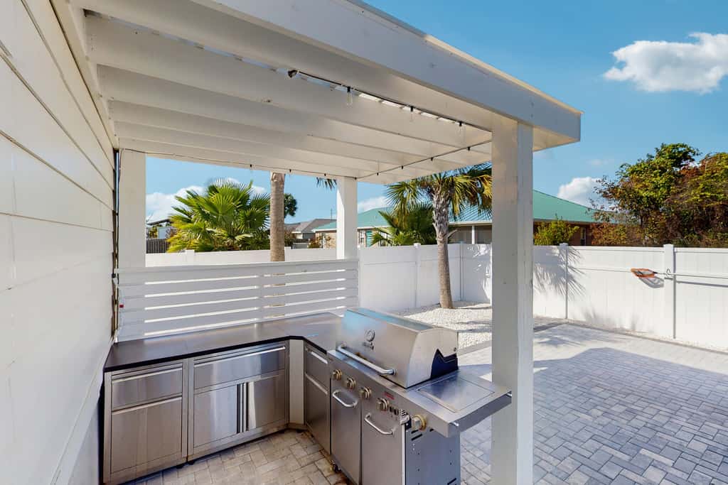 Dog friendly, coastal retreat with fenced yard, private pool, golf cart and cove