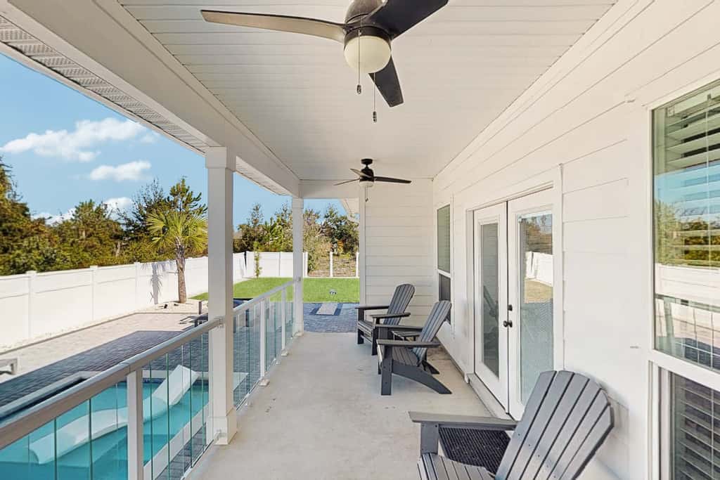 Dog friendly, coastal retreat with fenced yard, private pool, golf cart and cove