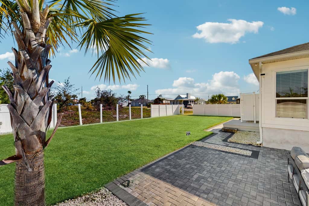Dog friendly, coastal retreat with fenced yard, private pool, golf cart and cove