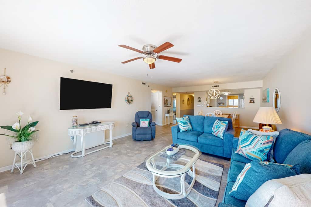 Gulf view & beachfront condo with balcony, pool, tennis, & gym