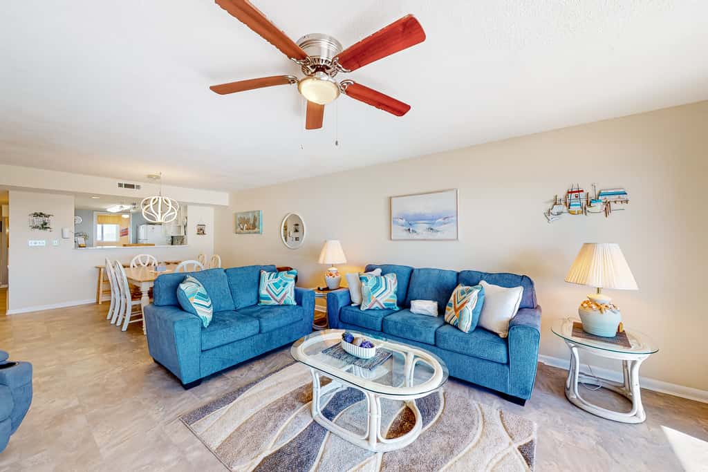 Gulf view & beachfront condo with balcony, pool, tennis, & gym