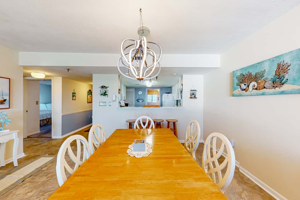 Gulf view & beachfront condo with balcony, pool, tennis, & gym