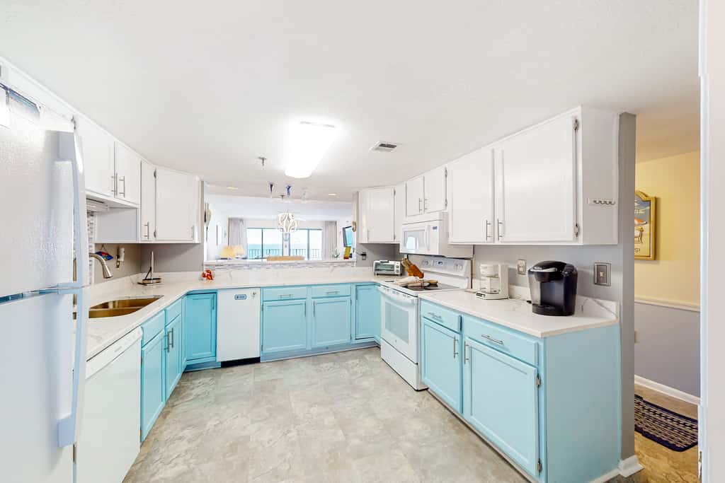 Gulf view & beachfront condo with balcony, pool, tennis, & gym