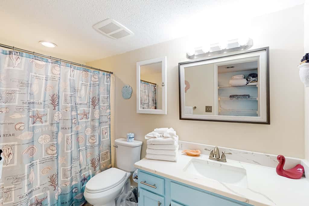 Gulf view & beachfront condo with balcony, pool, tennis, & gym