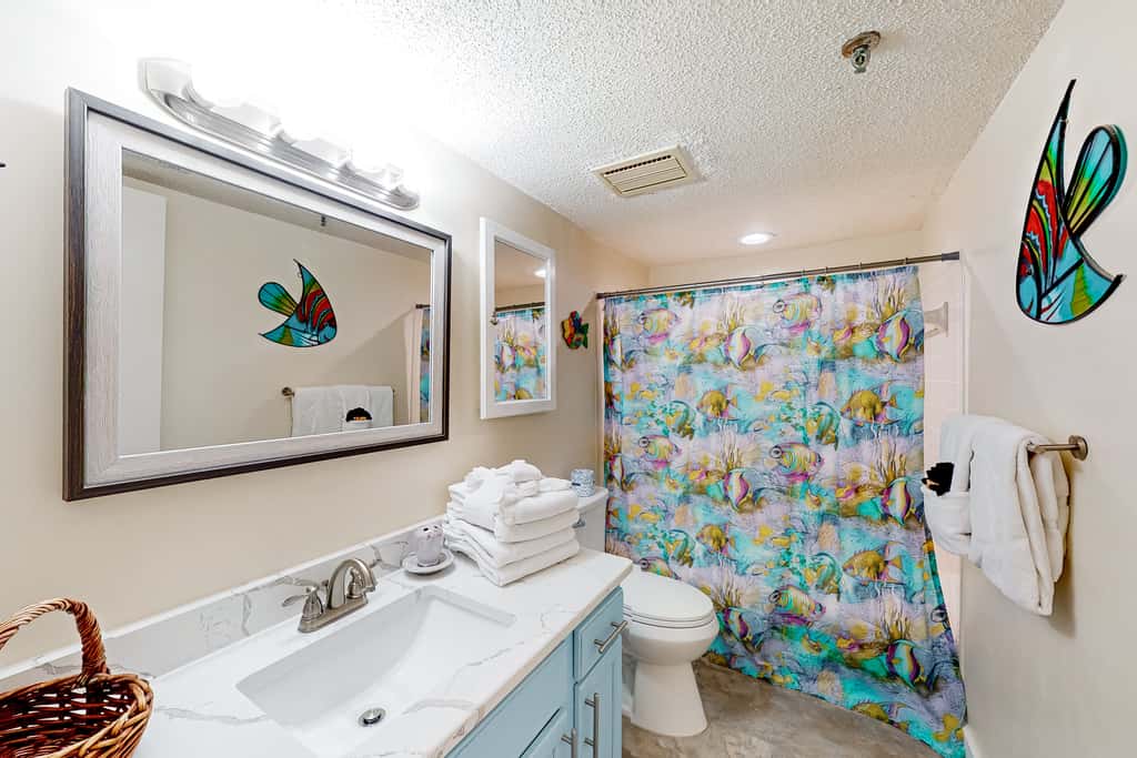 Gulf view & beachfront condo with balcony, pool, tennis, & gym
