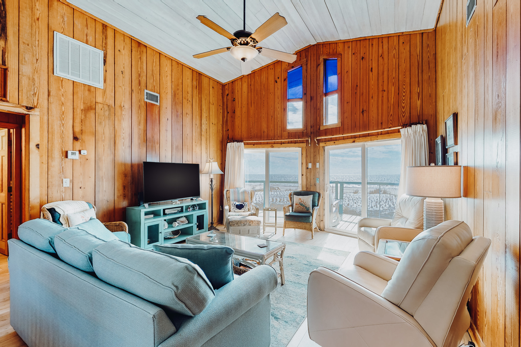 Gulf-front home with WiFi, private beach boardwalk & views - dog-friendly