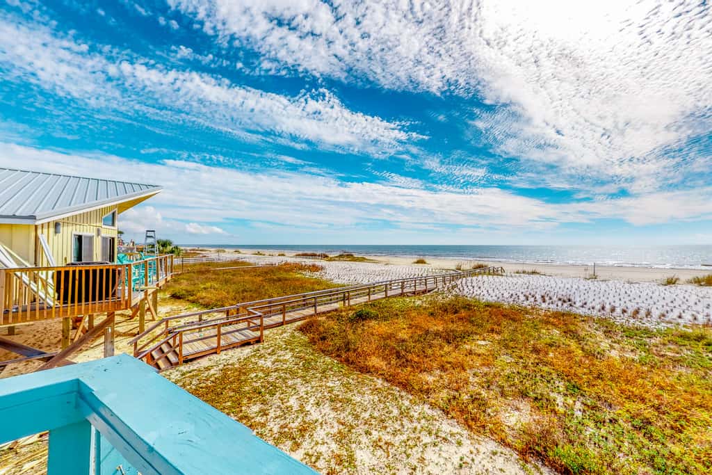 Gulf-front home with WiFi, private beach boardwalk & views - dog-friendly