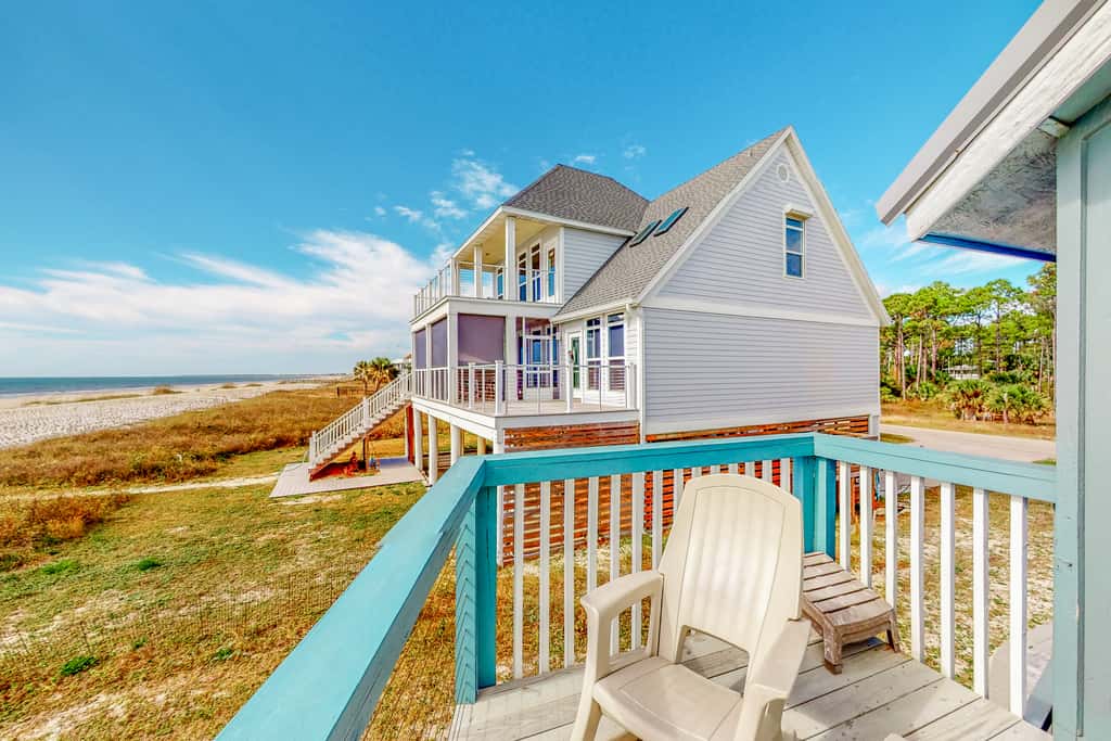 Gulf-front home with WiFi, private beach boardwalk & views - dog-friendly