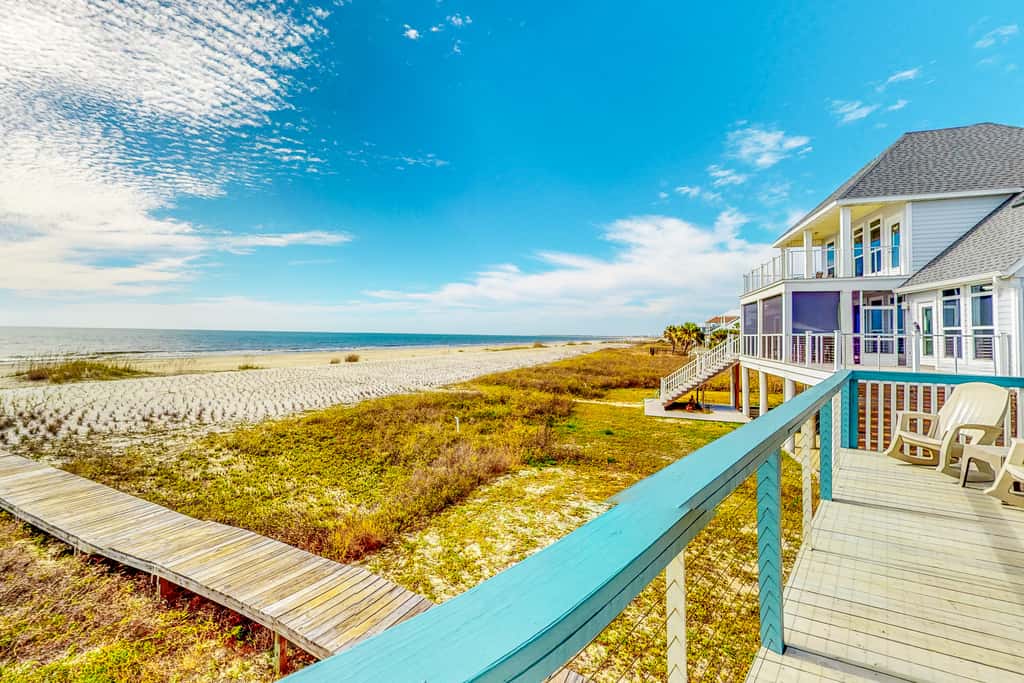 Gulf-front home with WiFi, private beach boardwalk & views - dog-friendly