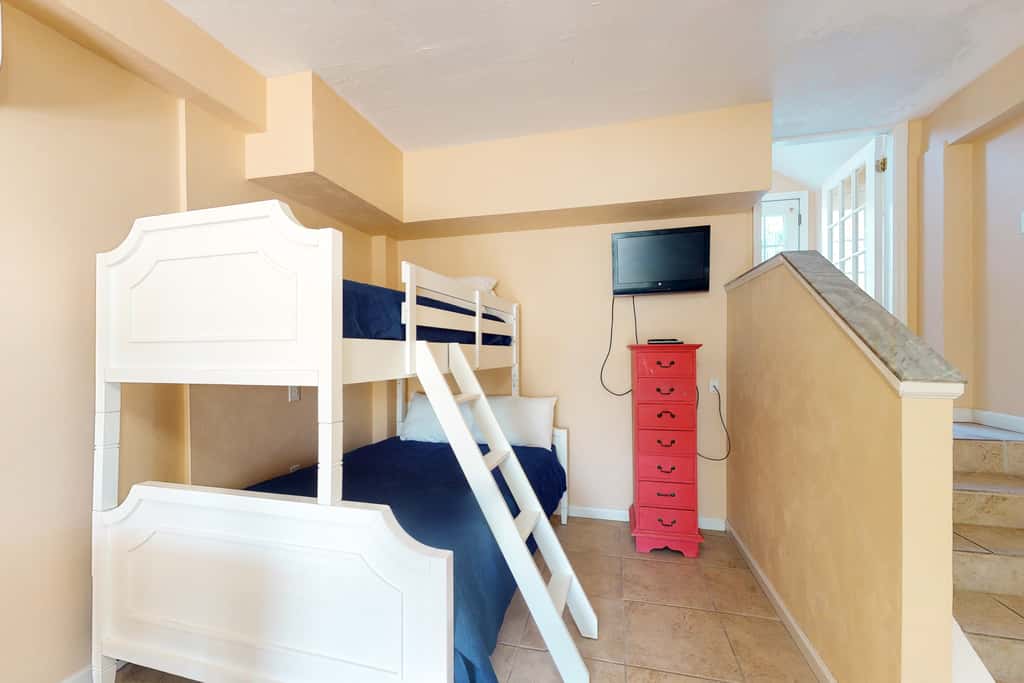 Beach Across the Street! Dog-Friendly Home with Private Pool, AC, WiFi & Games!