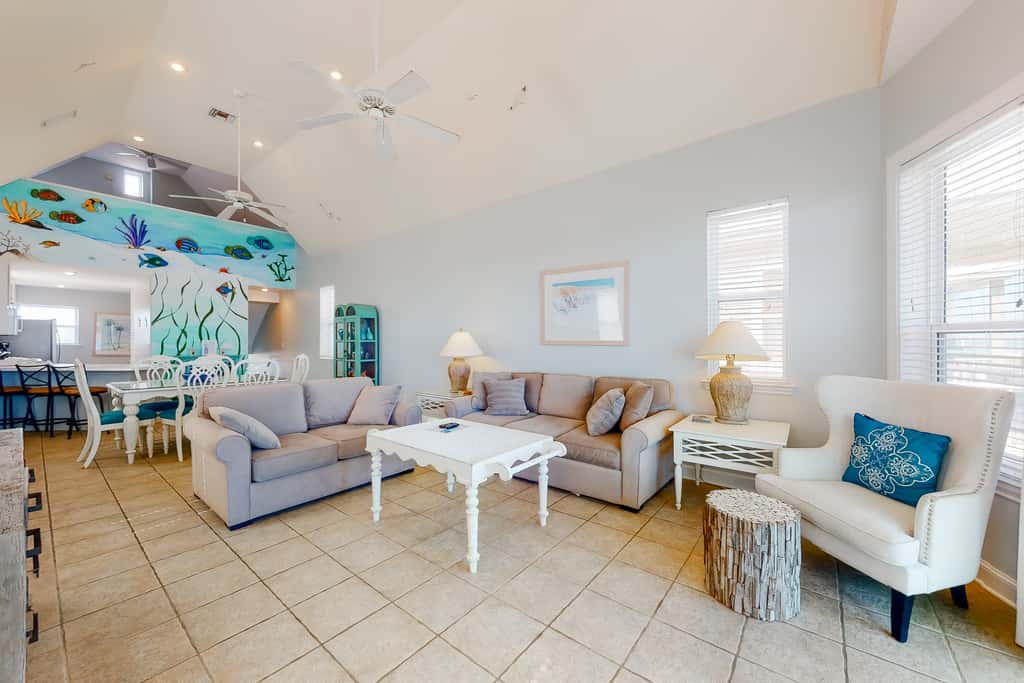 Dog-friendly beachfront home with private boardwalk, park style grill, deck, beach view