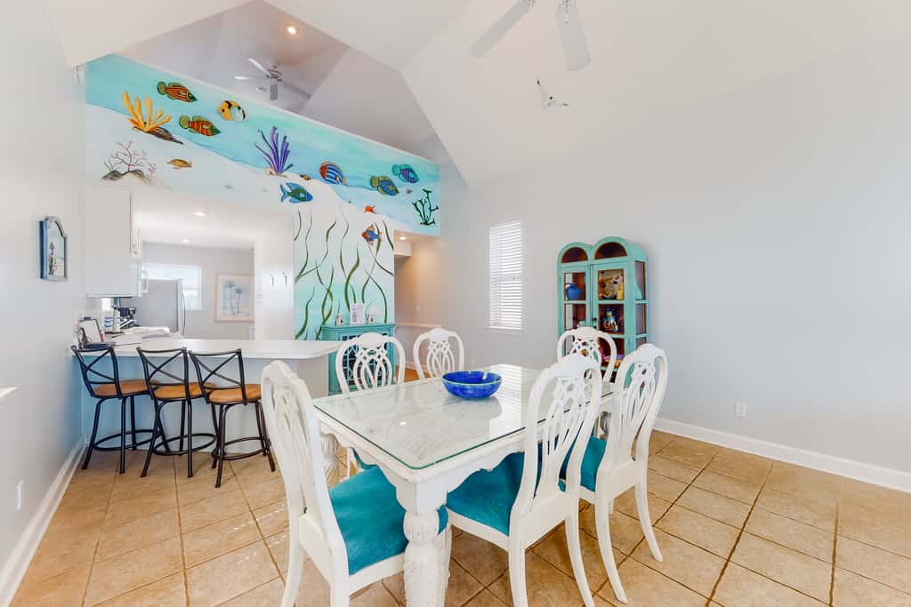 Dog-friendly beachfront home with private boardwalk, park style grill, deck, beach view
