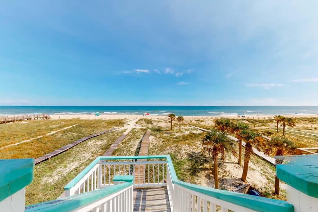 Dog-friendly beachfront home with private boardwalk, park style grill, deck, beach view