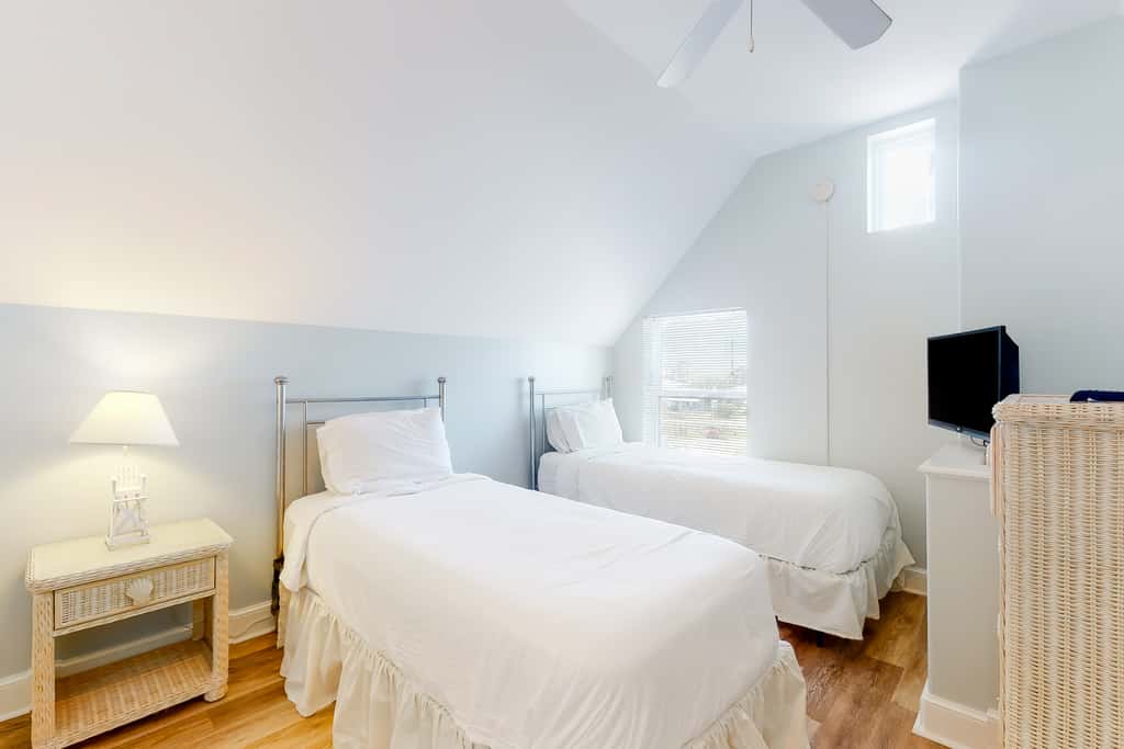Dog-friendly beachfront home with private boardwalk, park style grill, deck, beach view