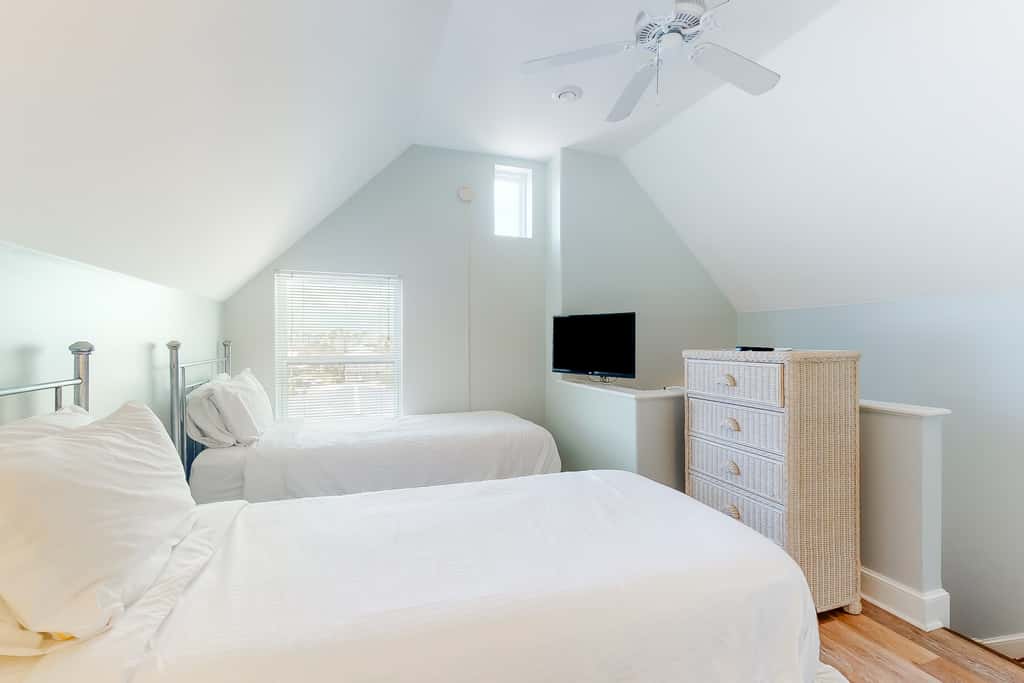 Dog-friendly beachfront home with private boardwalk, park style grill, deck, beach view
