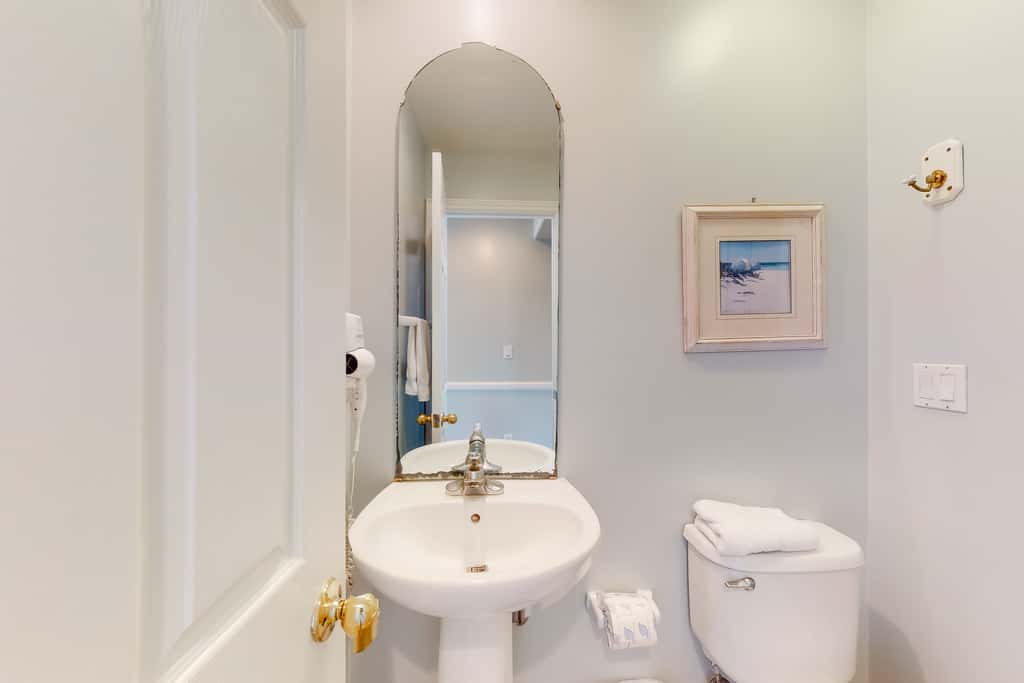 Dog-friendly beachfront home with private boardwalk, park style grill, deck, beach view