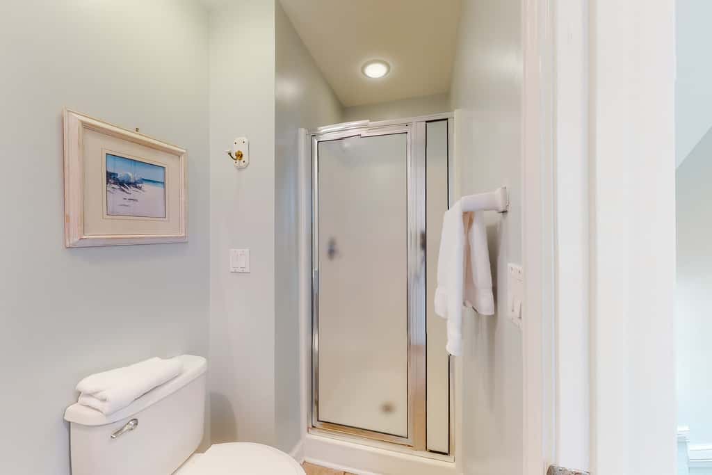 Dog-friendly beachfront home with private boardwalk, park style grill, deck, beach view