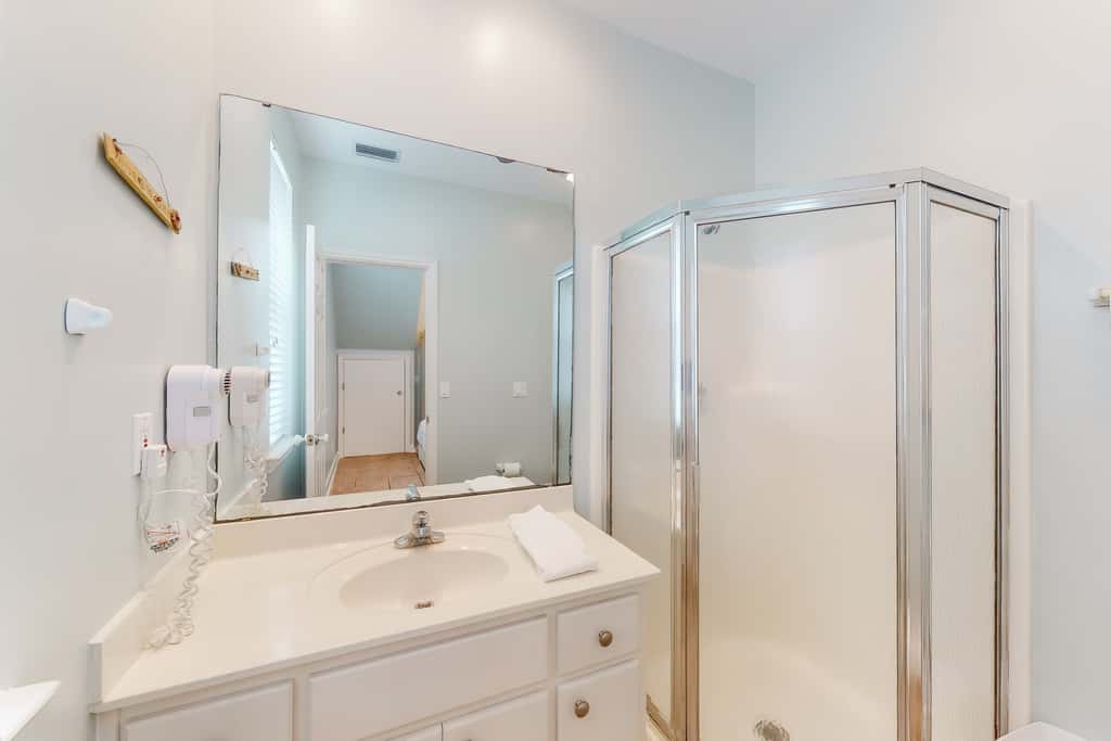 Dog-friendly beachfront home with private boardwalk, park style grill, deck, beach view