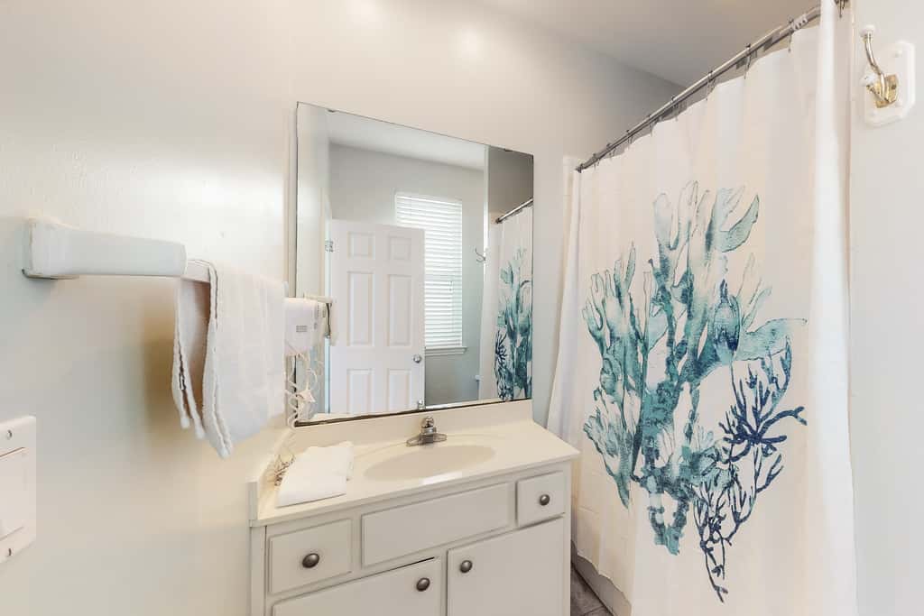 Dog-friendly beachfront home with private boardwalk, park style grill, deck, beach view