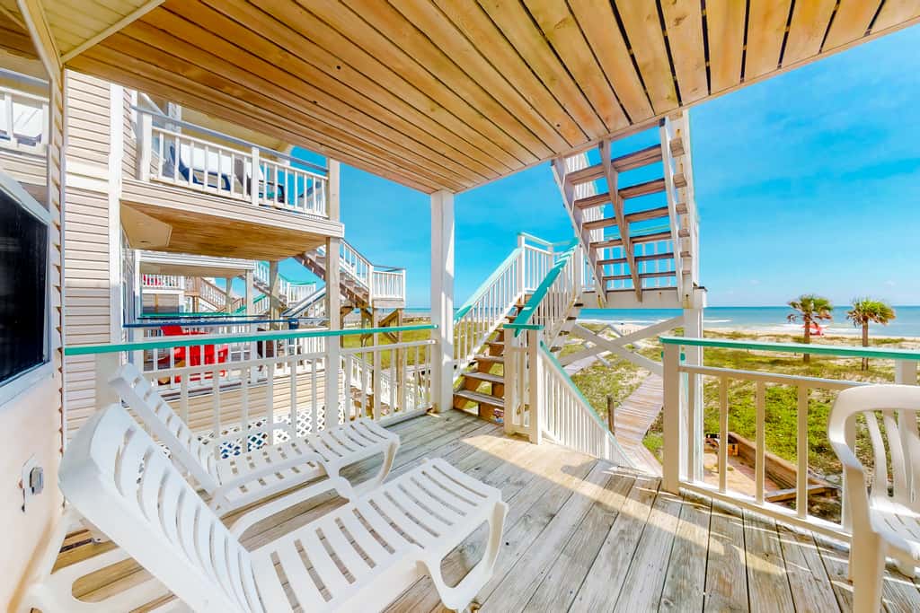 Dog-friendly beachfront home with private boardwalk, park style grill, deck, beach view