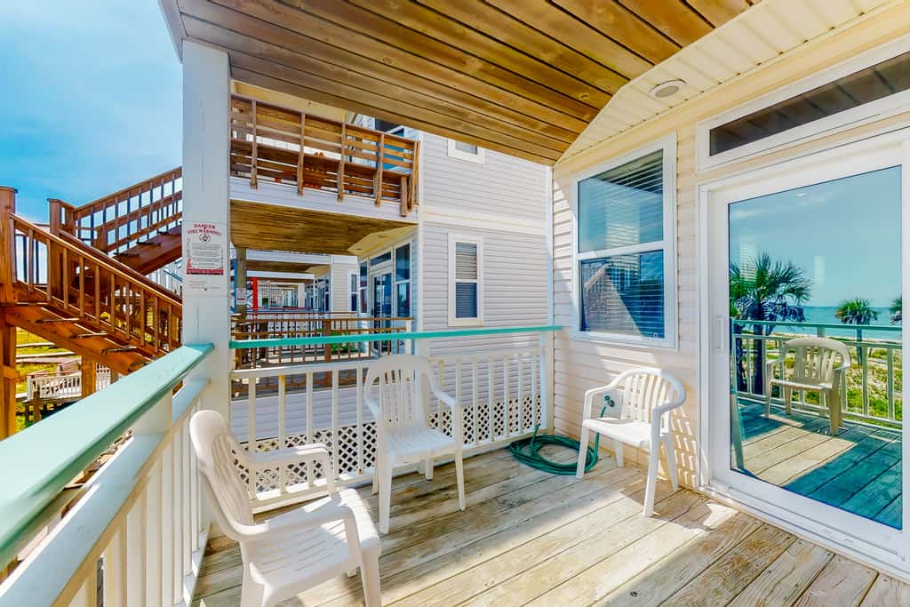 Dog-friendly beachfront home with private boardwalk, park style grill, deck, beach view
