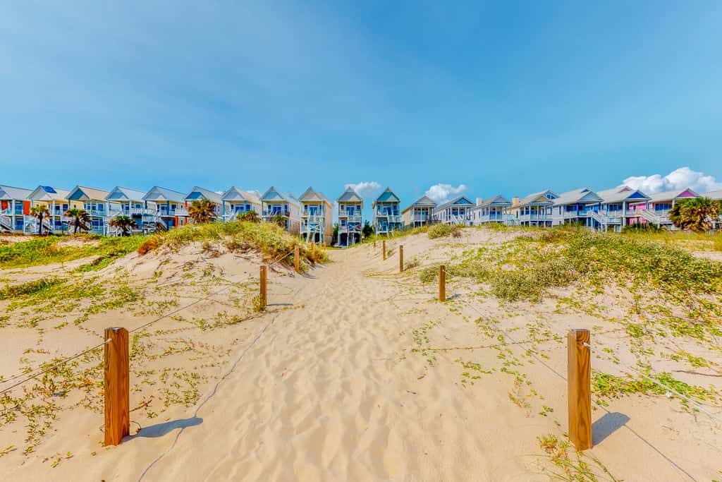 Dog-friendly beachfront home with private boardwalk, park style grill, deck, beach view