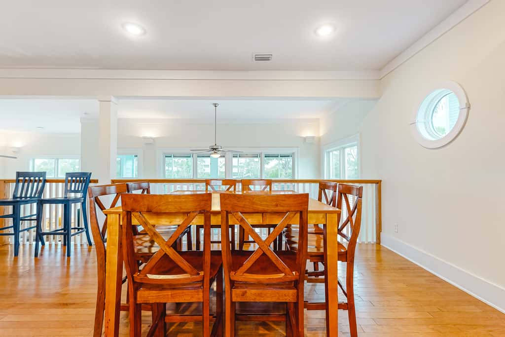 Spacious dog-friendly home with elevator, screened decks, on-site pool, & gym