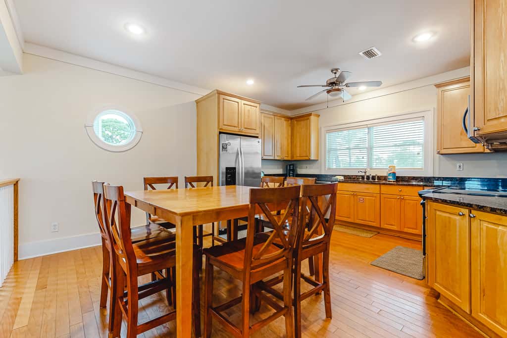 Spacious dog-friendly home with elevator, screened decks, on-site pool, & gym