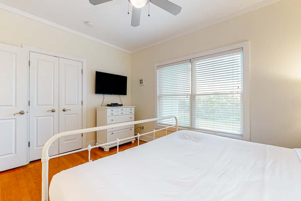 Spacious dog-friendly home with elevator, screened decks, on-site pool, & gym