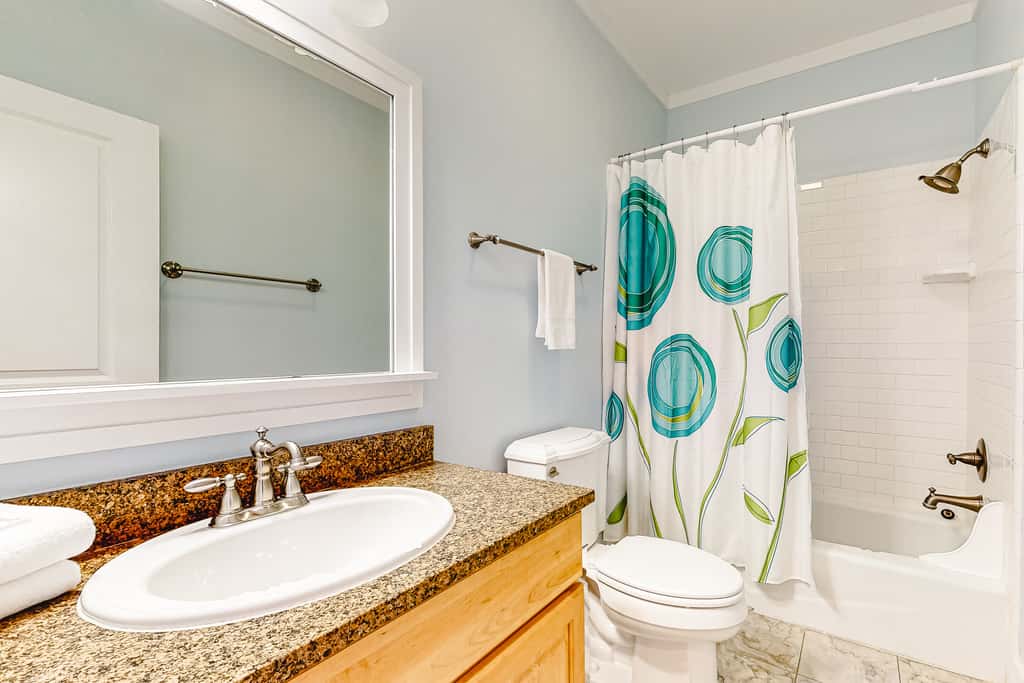 Spacious dog-friendly home with elevator, screened decks, on-site pool, & gym