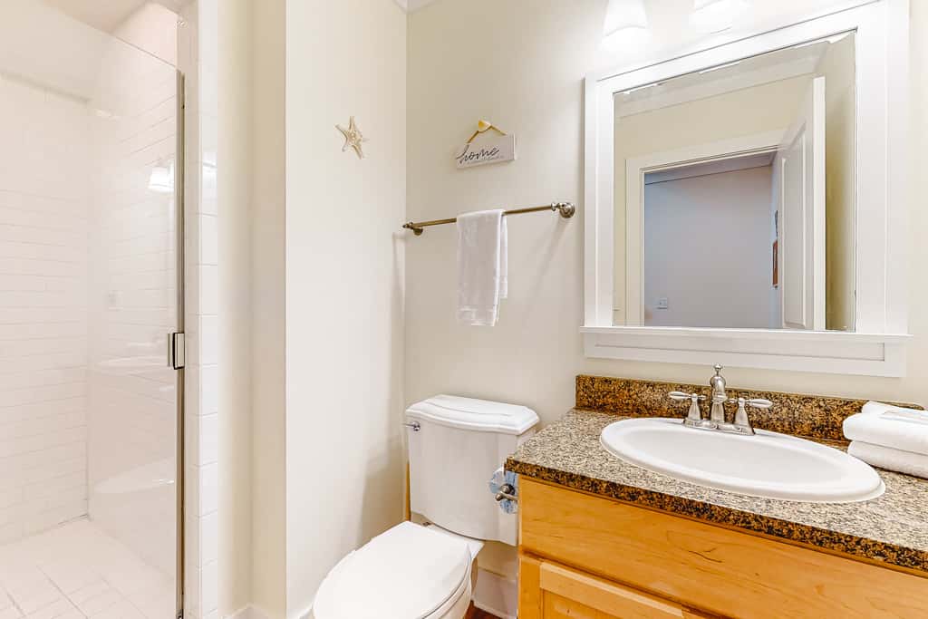 Spacious dog-friendly home with elevator, screened decks, on-site pool, & gym