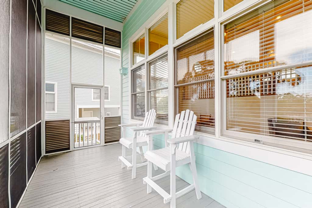 Spacious dog-friendly home with elevator, screened decks, on-site pool, & gym