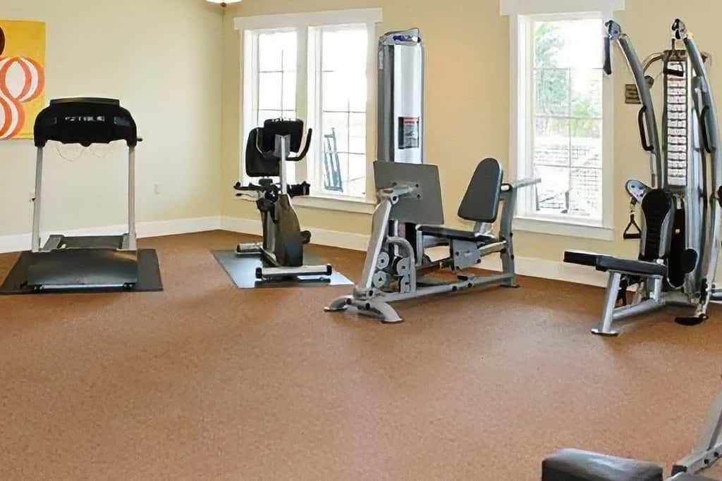 Spacious dog-friendly home with elevator, screened decks, on-site pool, & gym