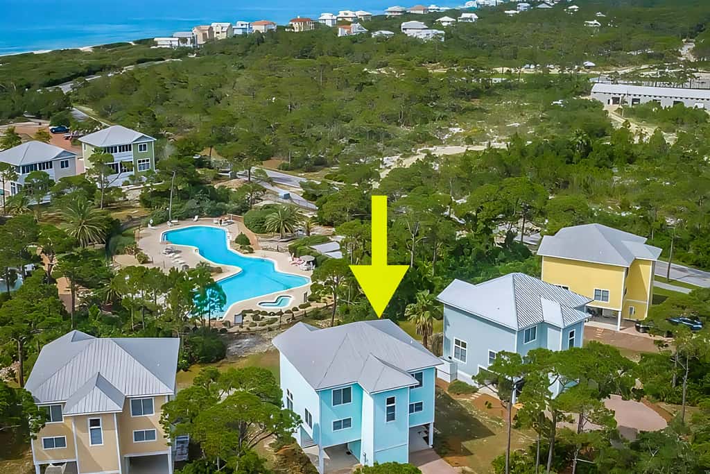 Spacious dog-friendly home with elevator, screened decks, on-site pool, & gym