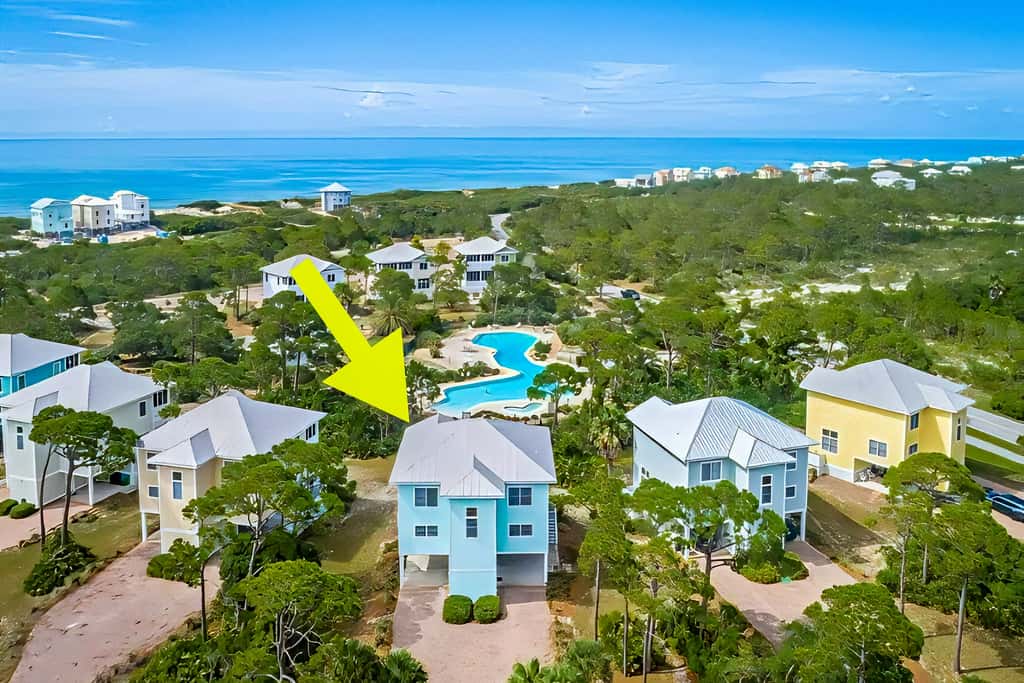 Spacious dog-friendly home with elevator, screened decks, on-site pool, & gym