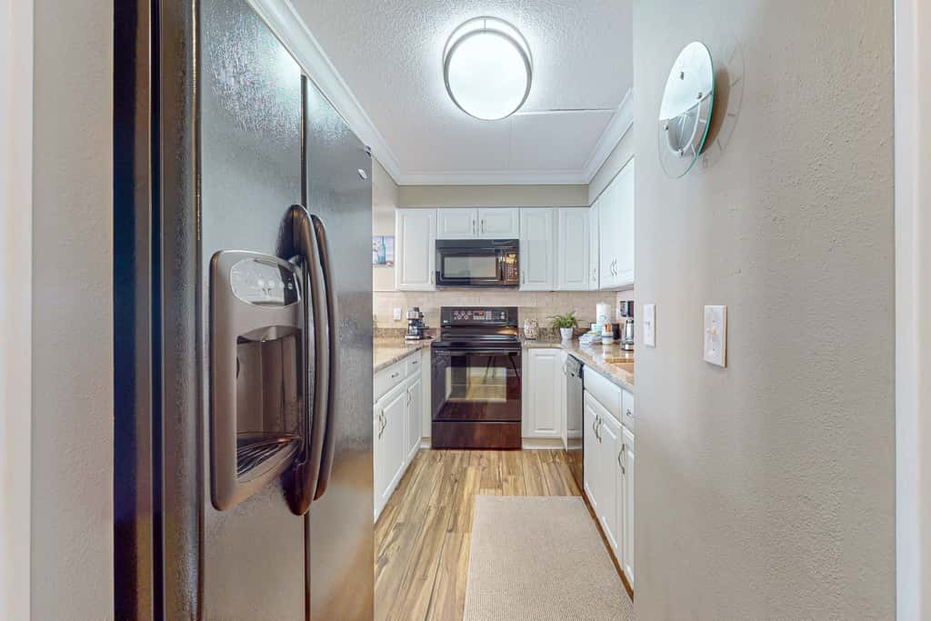 Cozy beachfront home with shared pool, private balcony and beach access