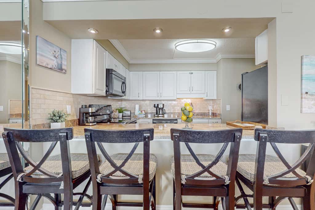 Cozy beachfront home with shared pool, private balcony and beach access