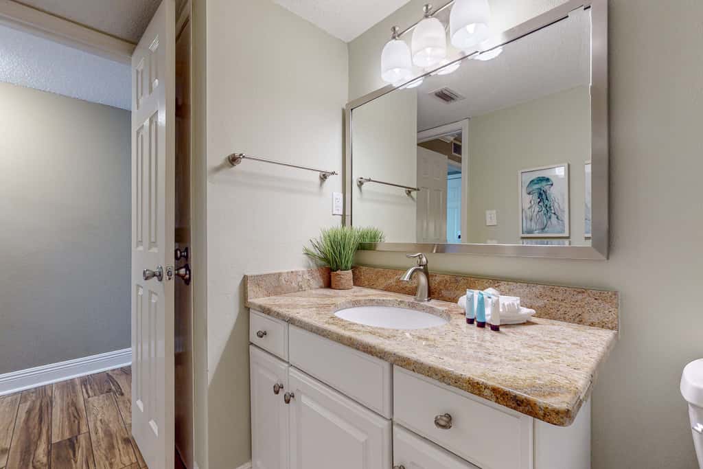 Cozy beachfront home with shared pool, private balcony and beach access