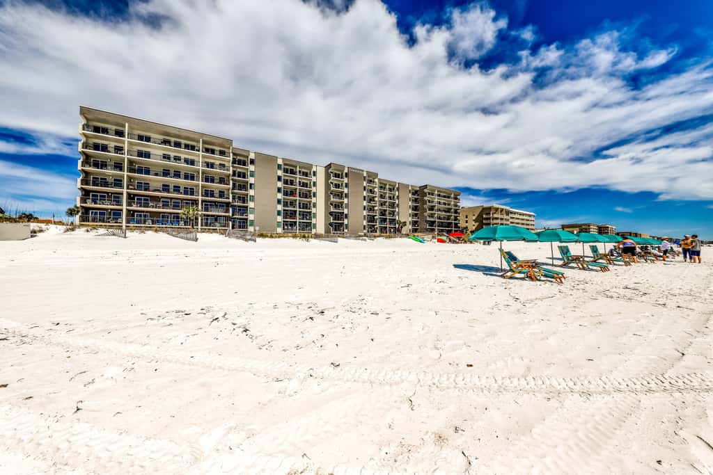 Cozy beachfront home with shared pool, private balcony and beach access