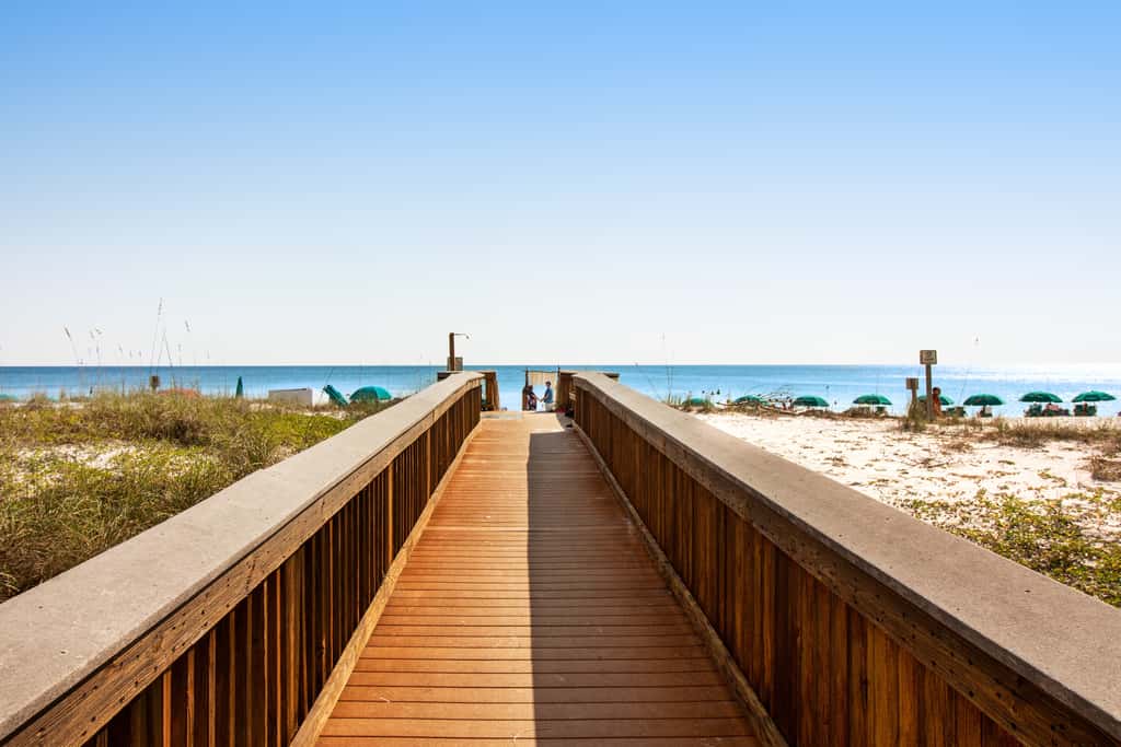 Cozy beachfront home with shared pool, private balcony and beach access