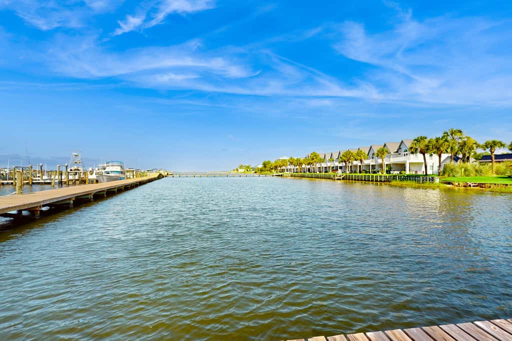 Cozy studio condo with water views, pools & amazing location