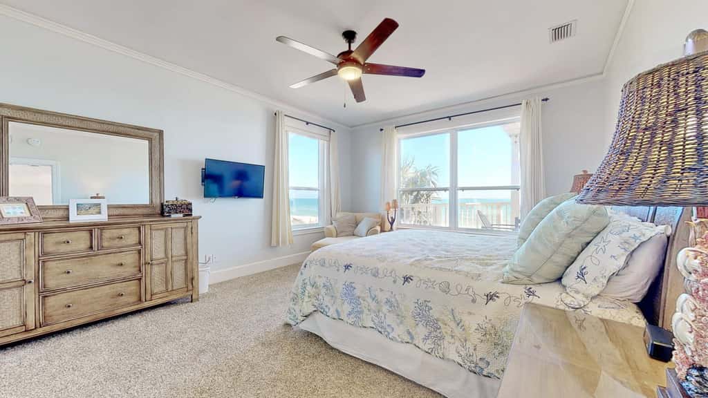 Upscale beachfront home with private hot tub, grill, on-site pools, gym, dogs OK