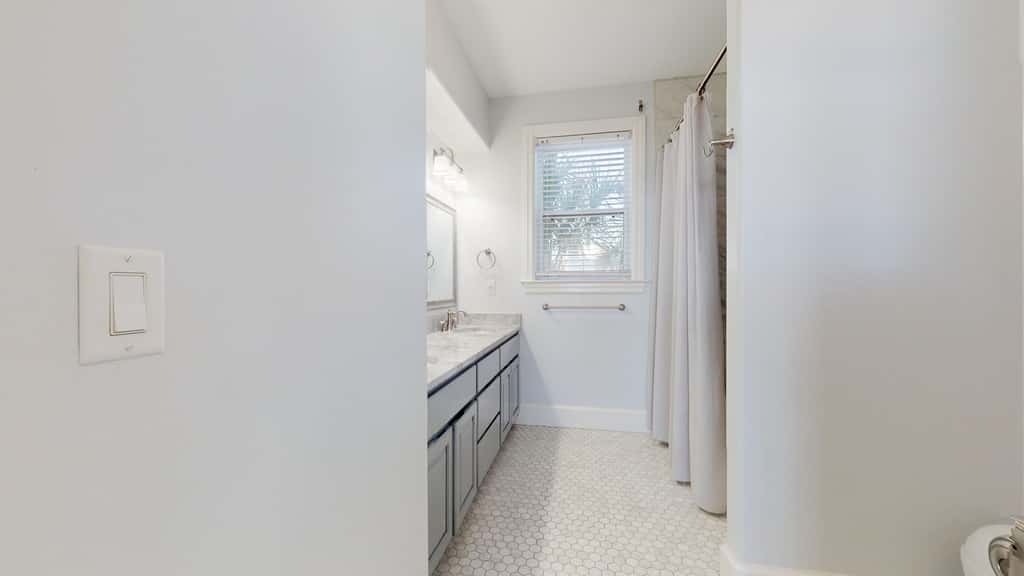 Upscale beachfront home with private hot tub, grill, on-site pools, gym, dogs OK