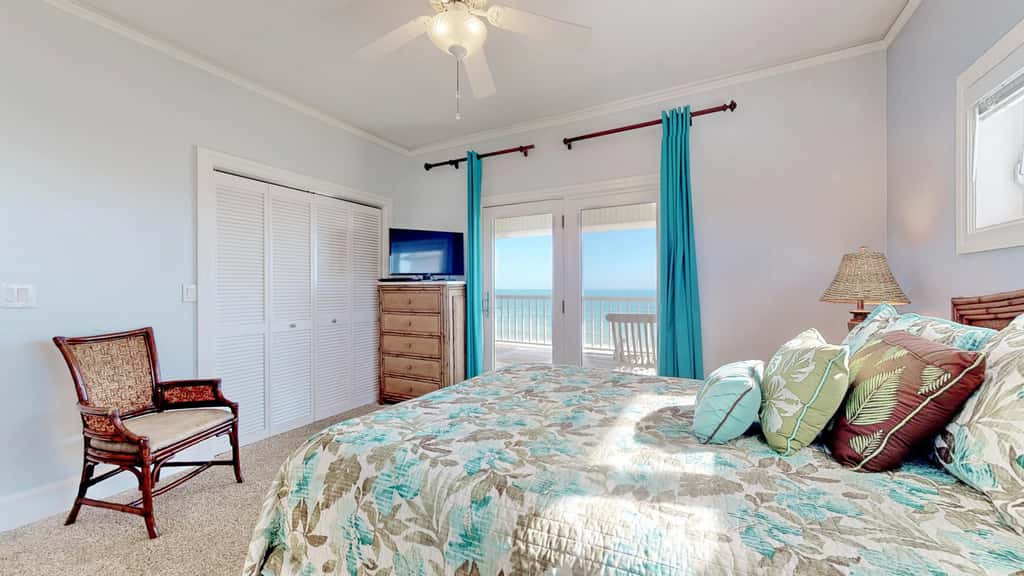 Upscale beachfront home with private hot tub, grill, on-site pools, gym, dogs OK