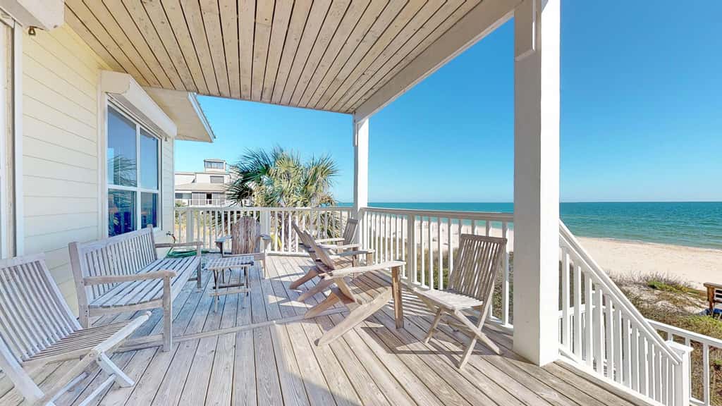 Upscale beachfront home with private hot tub, grill, on-site pools, gym, dogs OK